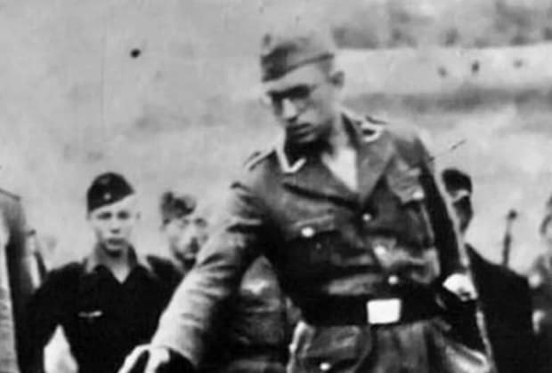 Descoperire tulburătoare: s-a aflat cine este soldatul SS din cea mai cutremurătoare imaginie a Holocaustului